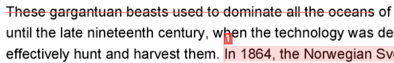 A block of text with a red line through the first sentence.