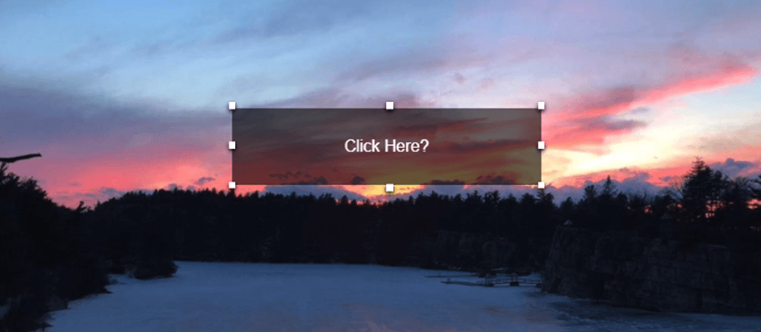 an image of a sunset, with a box with selection handles containing the text "click here?"